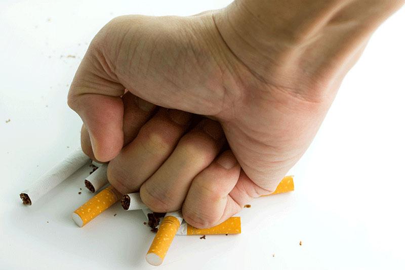 Quit Smoking Hand Smashing Cigarettes